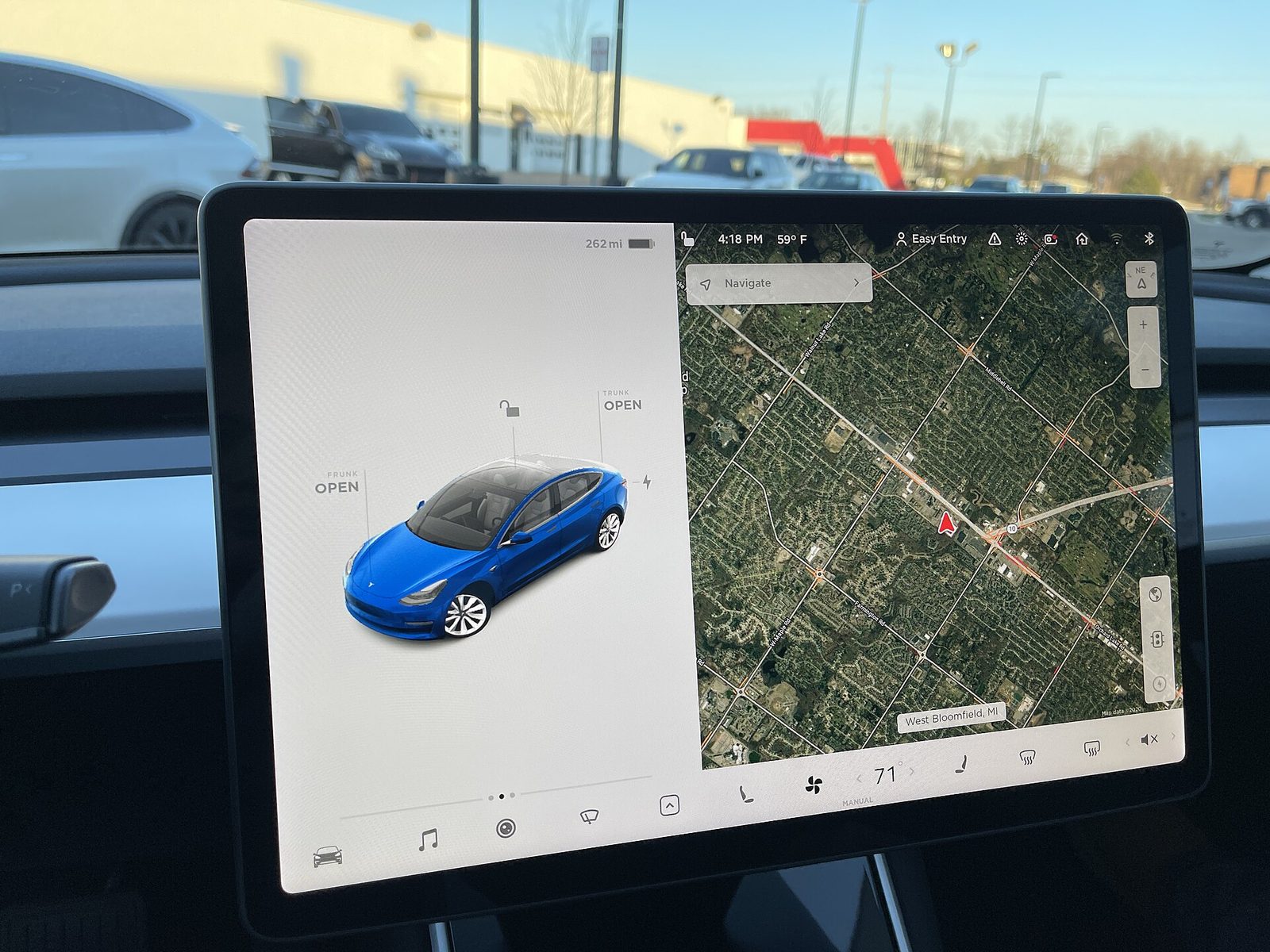 The centre touchscreen of a Tesla Model 3 showing the vehicle interface